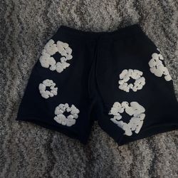 dark blue denim tear shorts