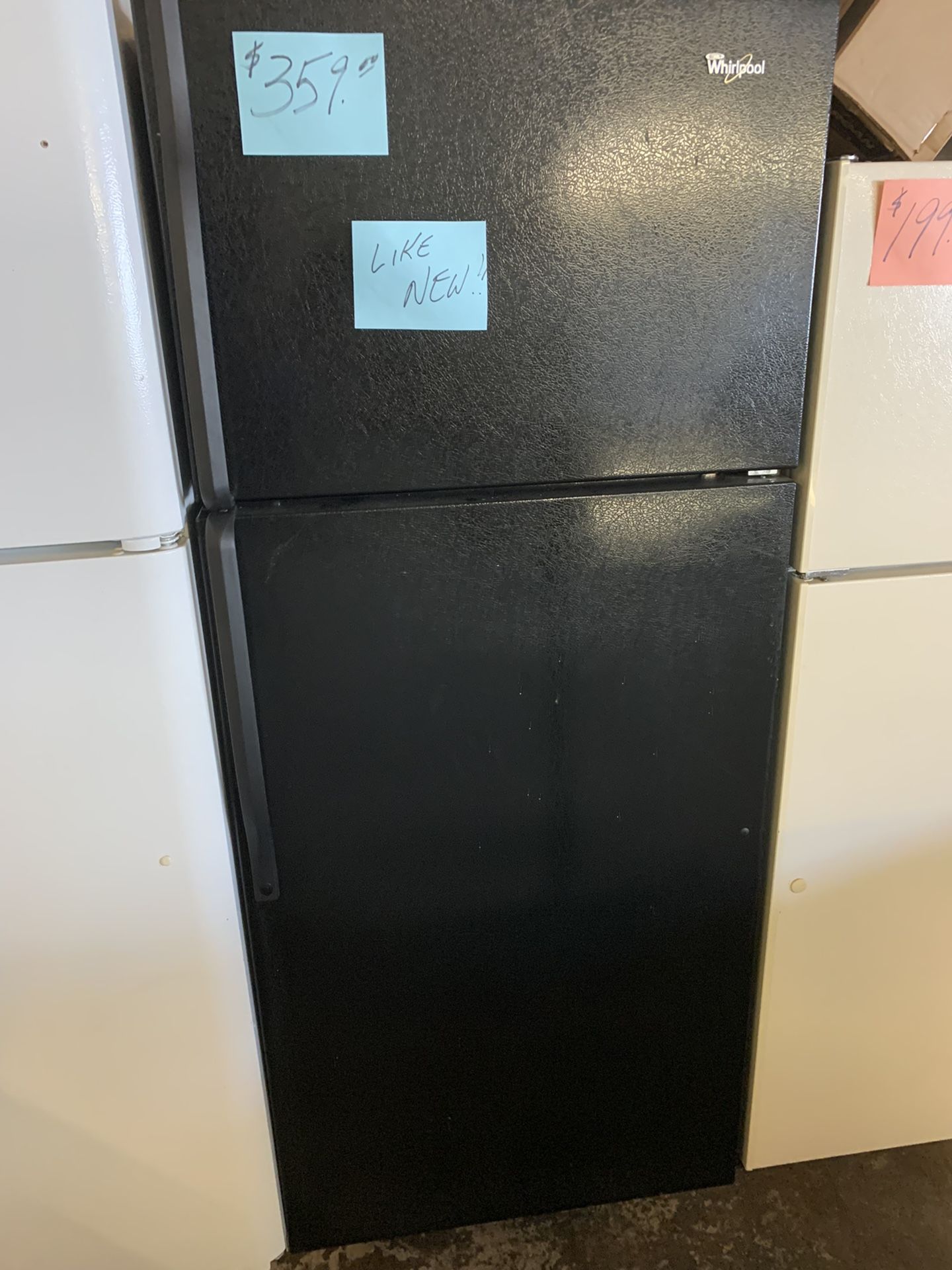 Whirlpool Refrigerator Black Like New .,