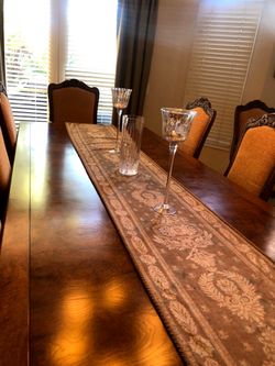 WHAT A DEAL!!!!Formal solid wood dining table with 10 upholstered and wood chairs.