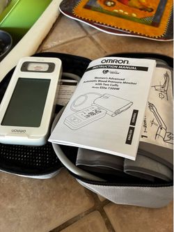 OMRON Automatic Arm Blood Pressure Monitor Model: Elite 7300W .