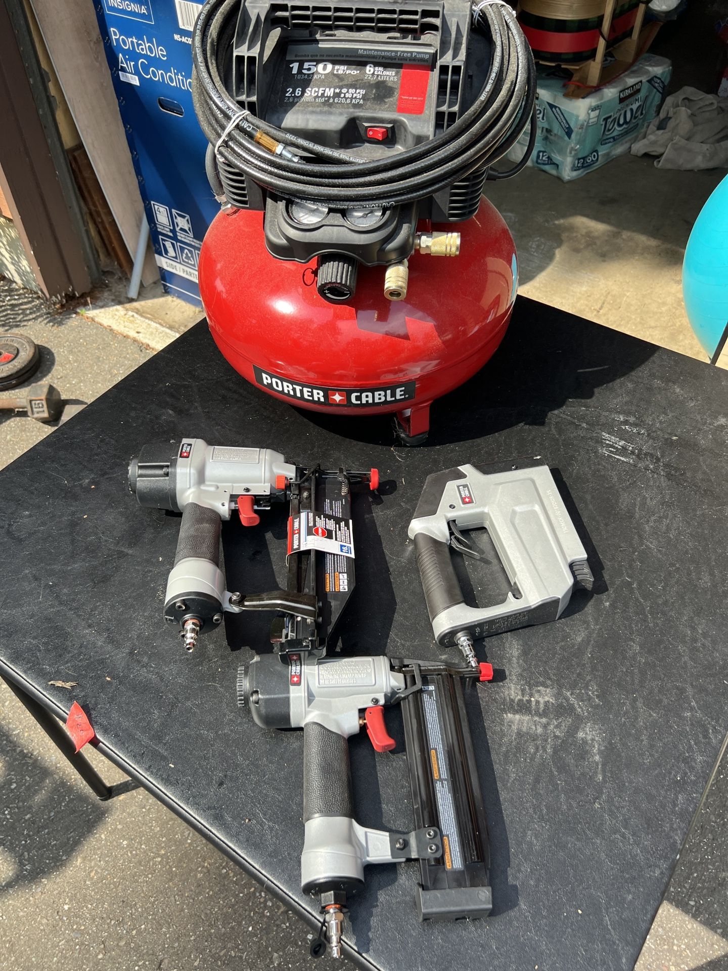 Porter Cable Air Compressor with 2 nail guns and 1 staple gun