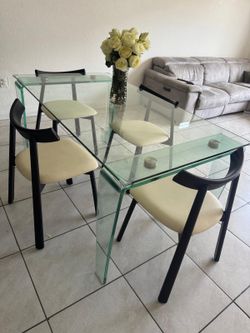 Glass table with chairs