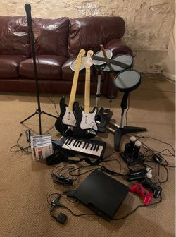 PS3 Gaming System, Rock Band Instruments, & collection of other games