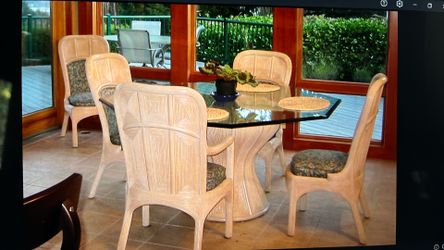 Octagon glass and wicker dining table