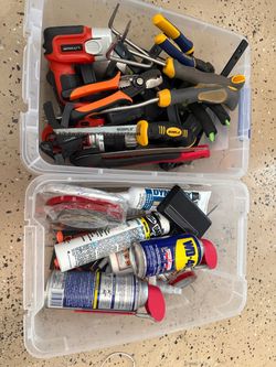 Garage clean out tools wrench pliers adhesives wd40