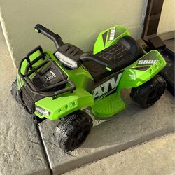 Kids ride on ATV