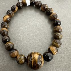 New, Beautiful Tiger Eye Stone Bracelet. Men’s And Women’s Size Available. Jewelry Bag Included.