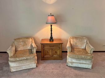 Beautiful gold color twin chairs no dimensions they are regular medium not too heavy