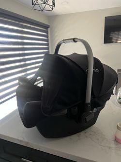 Nuna car seat and base