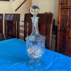 Vintage collectible clear glass 15 inch tall grape leaf edged decanter with glass top or with shells inside