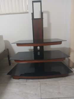 Entertainment unit:Three tier glass shelves