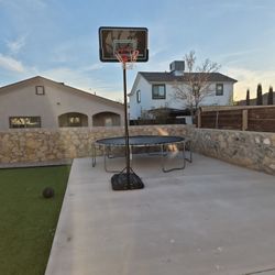 Trampoline and Basketball Goal