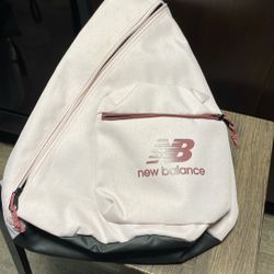 New Balance Athletics Large Sling Bag in Stone Pink color. 