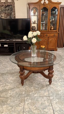 Ashley Millennium round wood and glass coffee table