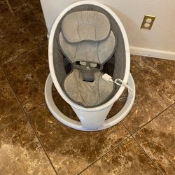 Munchkin Bluetooth Enabled Baby Swing in a light grey color