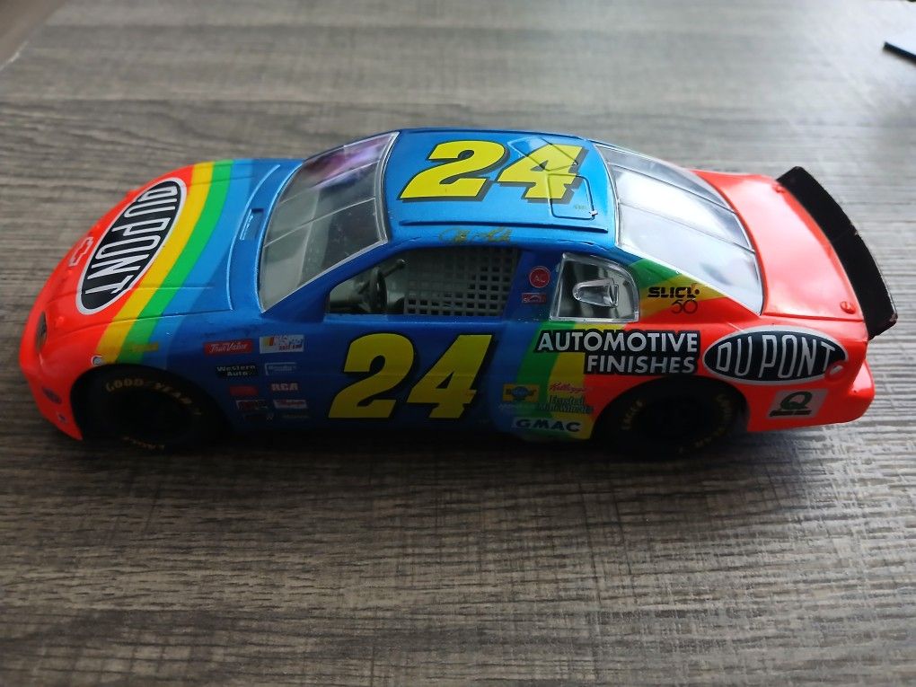 NASCAR Race Car Diecast model of Jeff Gordon's #24 DuPont Chevrolet NASCAR race car. It is a collectible item that is popular among NASCAR Fans