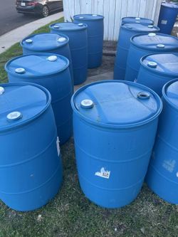 55 Gallon Plastic Drums Closed Top ) $20 Each