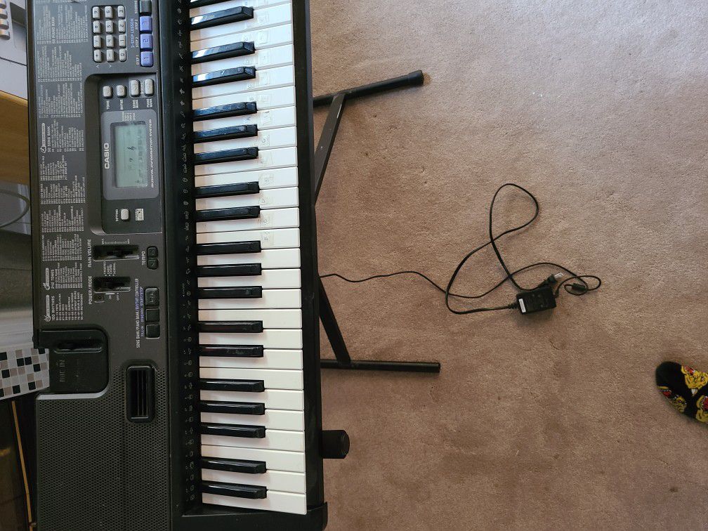 Casio keyboard with stand