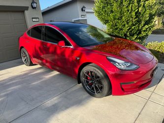 Tesla Model 3 Red Electric Sedan
