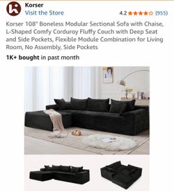 Used Black No Bones Black Couch
