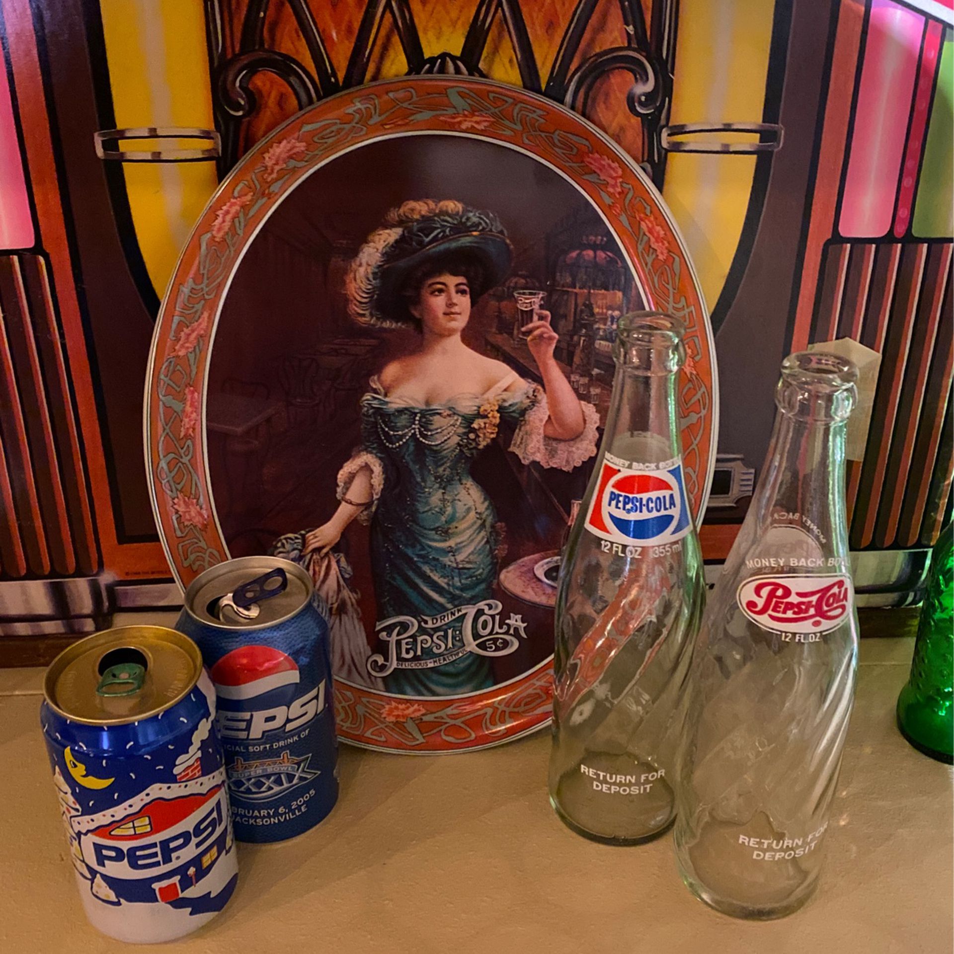 Pepsi serving tray and vintage bottles