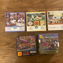 300-Piece Puzzles…$20 for all. 