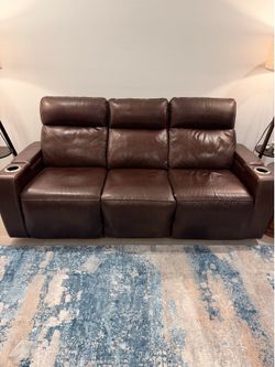 Leather sofa with recliners