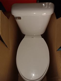 Mansfield toilet w/seat cover