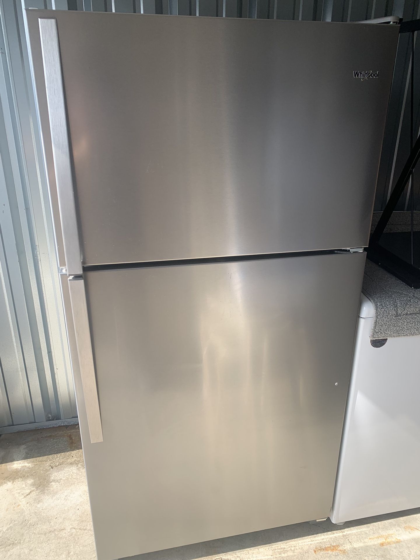 Whirlpool 20.5 cu. ft. Top Freezer in Monochromatic Stainless Steel 