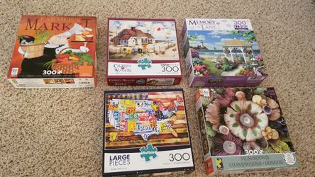 Jigsaw puzzles 300 piece each. 5 puzzles