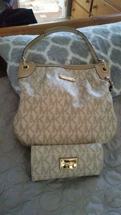 Michael Kors purse and wallet good condition