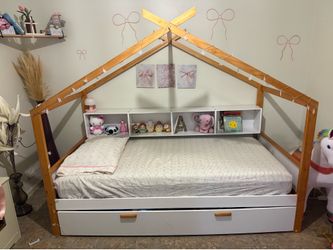 Twin bed and the bottom drawer is also  a bed