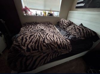 Queen beset with mattress and tall dresser