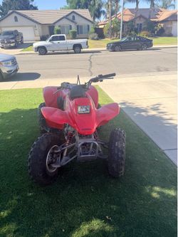 Red 2003 Honda TRX 250EX