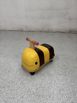 B. toys Wooden Bee Ride-On (Boom Buggy)