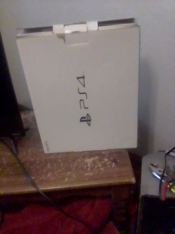 Selling A PS4 Concal With One Conctler With One Charging Cord For The Controller And A Power Cord