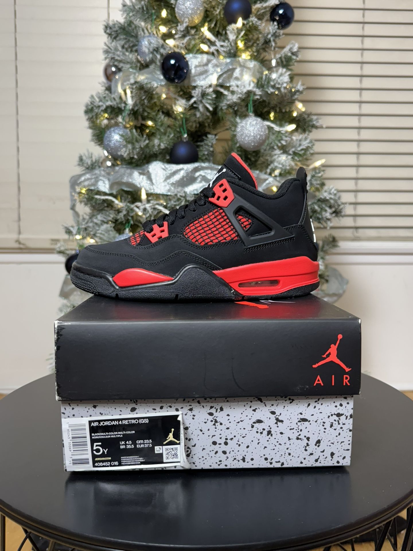 Jordan 4 Retro “Red Thunder”