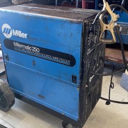 Miller Millermatic 250 Wire Feed Electric Mig Welder. No Gun included . The machine powers up and idles good. No gun. No further testing done.  Sold A