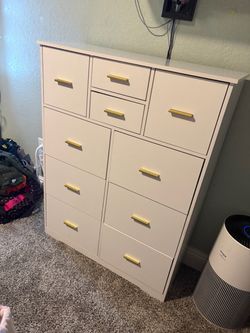White dresser with gold handles