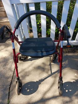 Walker with seat