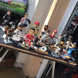 Collectible bobble heads and other sports figures