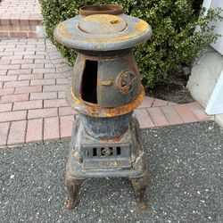 Rustic UMCO Cast Iron Pot Belly Stove