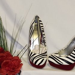 Maroon zebra print pumps size 7