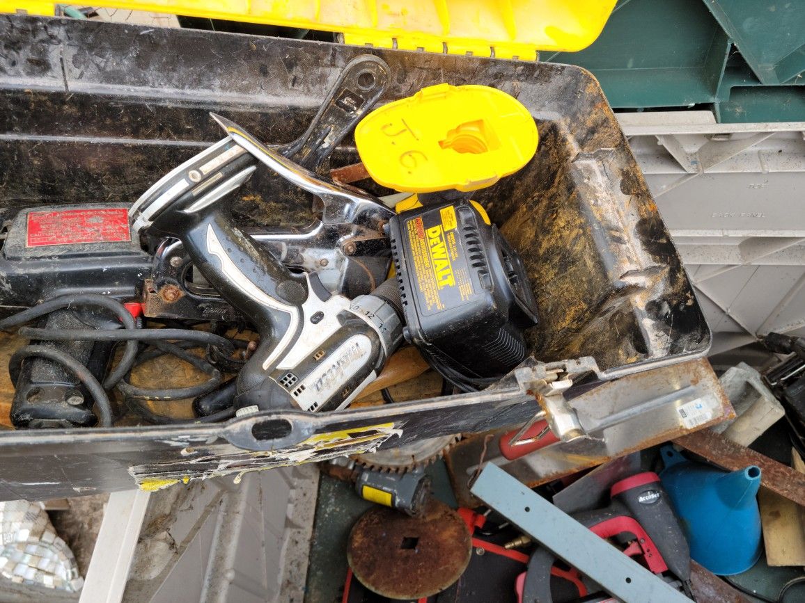 2 Tool boxes with tools in it