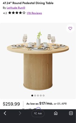New round pedestal dining table