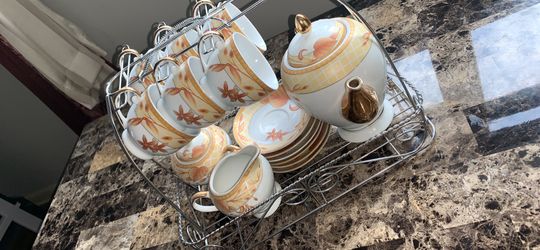 18pc tea set with kettle stand used only once for tea, almost new! Cups are s/M size