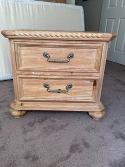Two drawer nightstand with wood and cute and embellishments Two drawer nightstand with wood and cute and embellishments