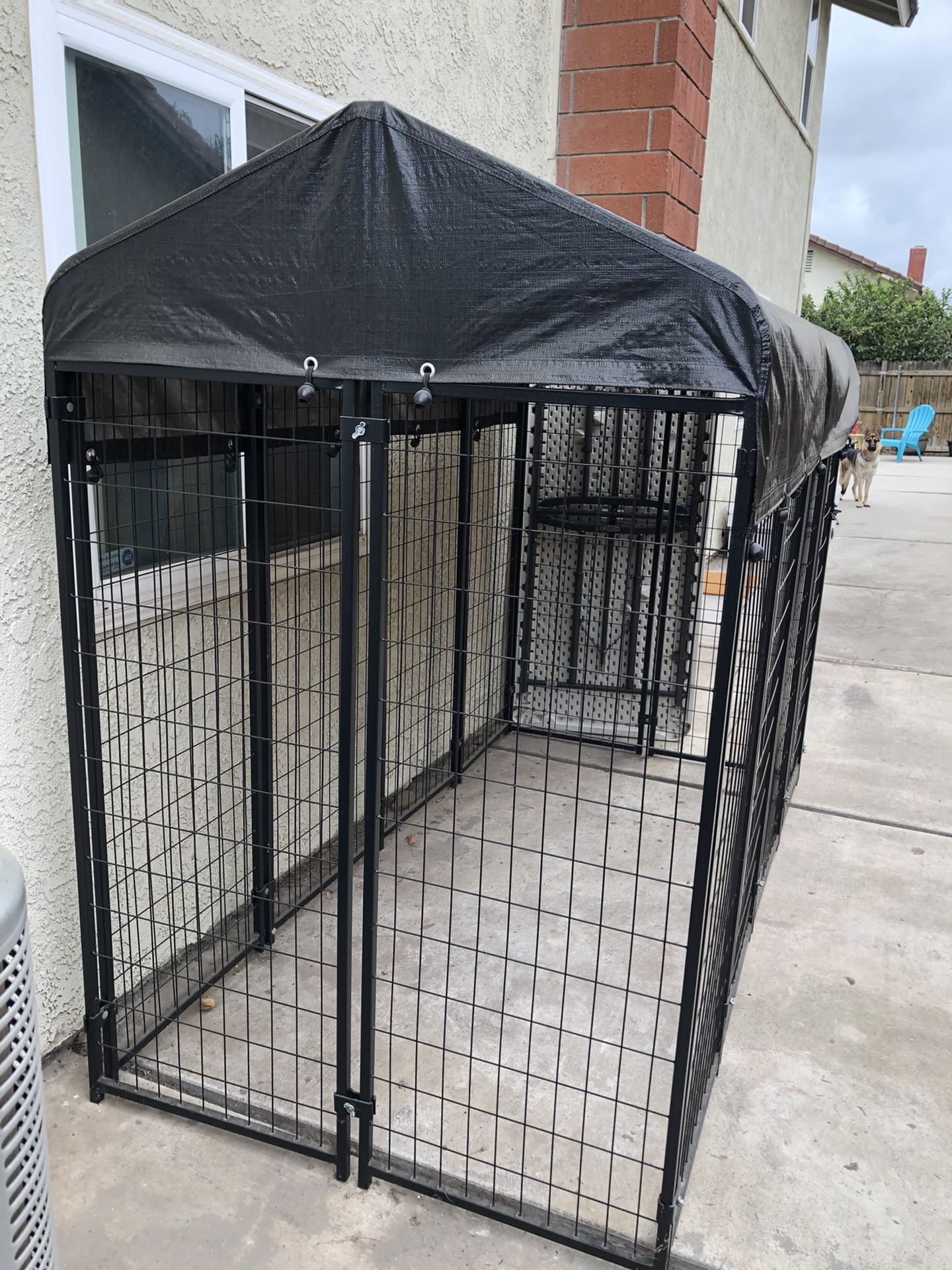Outdoor covered dog kennel