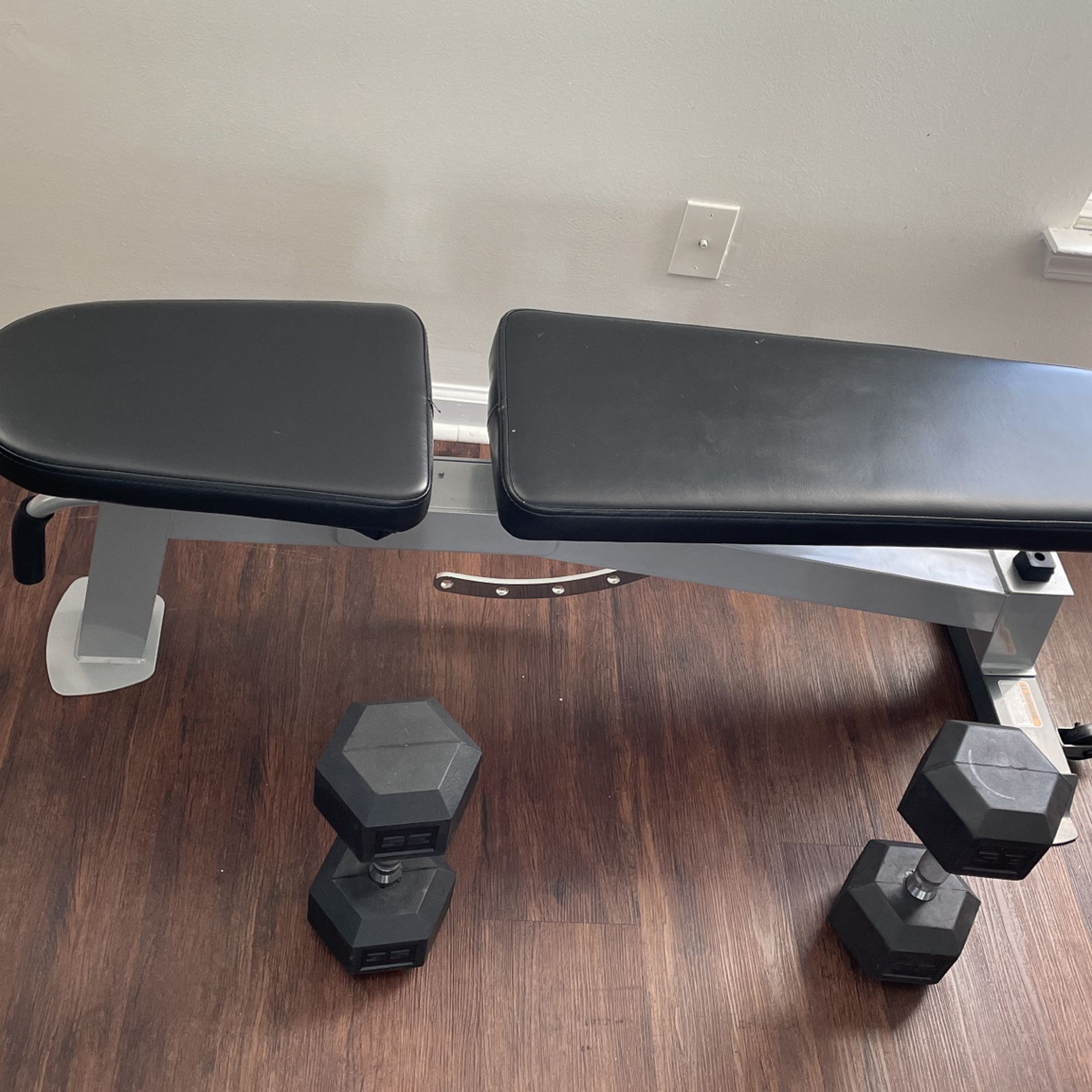 Utility Bench And 2- 35lbs Weights For Separate Sale 