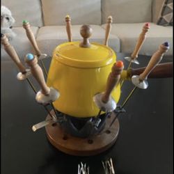 Complete 1960’s Enamel Fondue Set with cast iron warmer. Usable